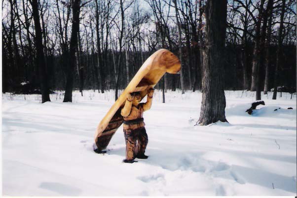 Frontier Man with a Canoe